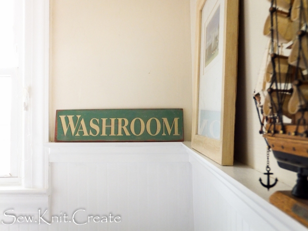 Washroom sign in cottage bathroom 